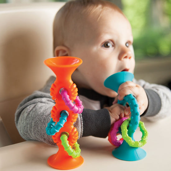 Mordedores y Sonajeros Sensoriales Pipsquigz Loops Naranjo FatBrain Toys