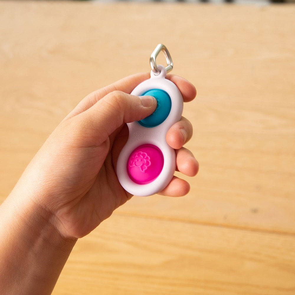 Llavero Para Manos Inquietas Colores Surtidos Simpl Dimpl FatBrain Toys